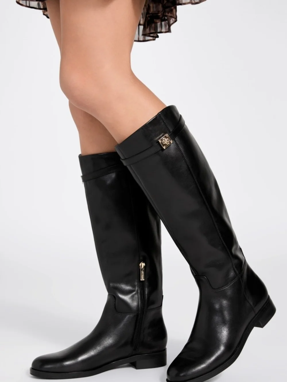 The GUESS Zoro riding boot is a beautiful silhouette Size 7m